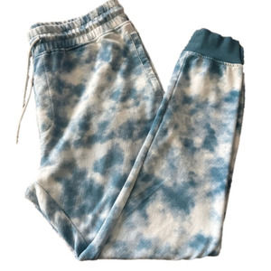 Men’s blue and white jogger pants with drawstring and elastic waist.